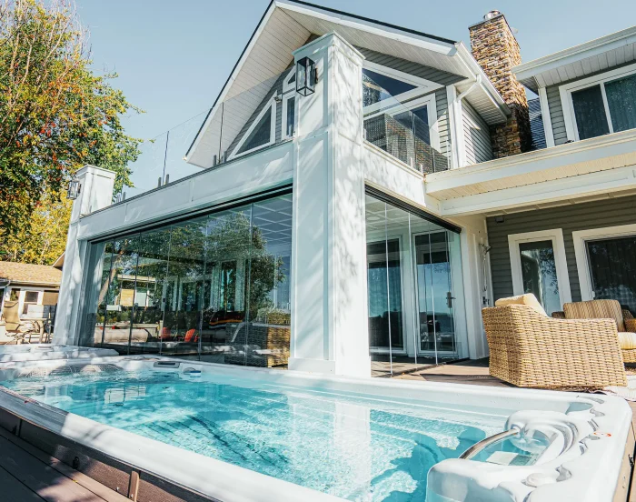 Custom sunroom with Lumon glass walls installed by Star Construction WA in Seattle